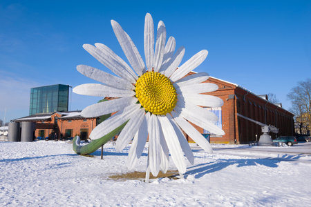 TURKU, FINLAND - FEBRUARY 23, 2018: A giant chamomile flower near the Forum Marinum exhibition center on a sunny winter dayのeditorial素材
