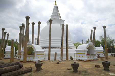 Ancient Thuparamaya Dagoba close-up of a cloudy day. Anuradhapura, Sri Lankaの写真素材