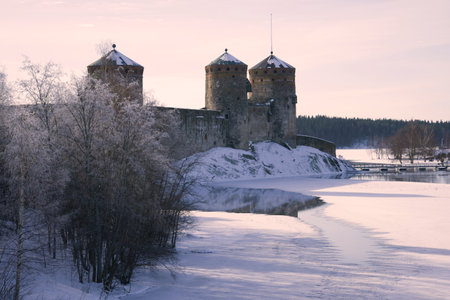 Winter morning in purple tones near the fortress of Olavinlinna. Savonlinna, Finlandのeditorial素材