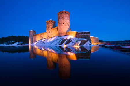 Olavinlinna fortress in the evening of March. Savonlinna, Finlandのeditorial素材