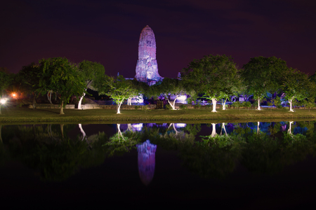 Ruins of the ancient temple of Wat Phra Ram in the night illumination. Ayutthaya, Thailandの写真素材