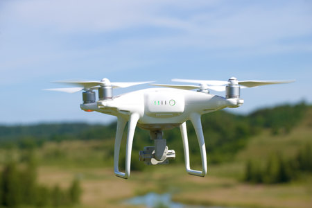 PSKOV, RUSSIA - JUNE 10, 2016: Flying quadrocopterのeditorial素材