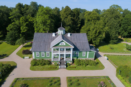 The mansion of PA Gannibal (a relative of AS Pushkin) in the Petrovskoe manor on a sunny summer day. Shooting with quadrocopter. Pushkin Mountainsのeditorial素材