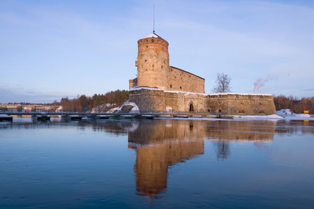 Olavinlinna fortress in the evening of March. Savonlinna, Finlandのeditorial素材