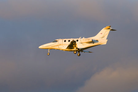 SAINT-PETERSBURG, RUSSIA - OCTOBER, 2018: Business jet Raytheon 390 Premier 1 (RA-02787) in the cloudy sky before landing on Pulkovo airportのeditorial素材