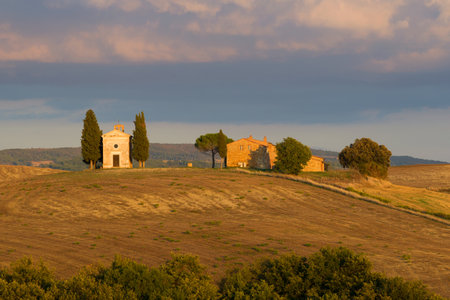 TUSCANY, ITALY - SEPTEMBER 23, 2017: Chapel della Madonna di Vitaleta on a September eveningのeditorial素材