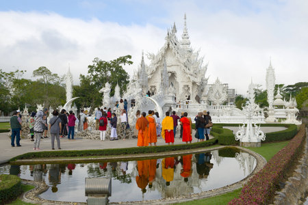 CHIANG RAI, THAILAND - DECEMBER 16, 2018: Tourists at the White Temple (Wat Rong Khun) on a cloudy morningのeditorial素材