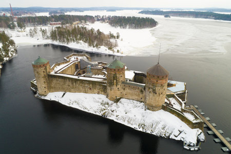 View of the ancient fortress of Savonlinna on overcast March day (aerial photography). Finlandのeditorial素材