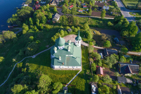 The top view on church of Christmas of John the Forerunner in the sunny May afternoon (aerial photograph). Old Ladoga, Russiaのeditorial素材