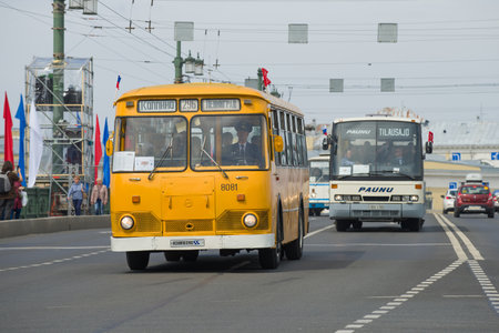 SAINT-PETERSBURG, RUSSIA - MAY 25, 2019: Soviet bus LiAZ-677M in a column of retro buses. Fragment...