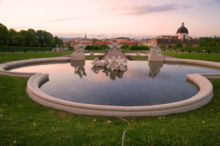 VIENNA, AUSTRIA - APRIL 26, 2018: Disabled fountain with naias in April evening. Palace complex Belvedereのeditorial素材