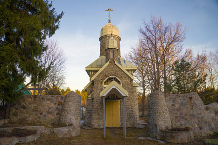 Chapel in the name of the apostles Peter and Paul in the village of Mountains of the Leningrad Region on an April evening. Russiaのeditorial素材