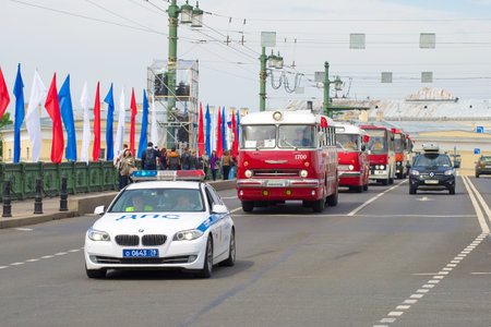 ST. PETERSBURG, RUSSIA - MAY 25, 2019: Column of Hungarian buses Ikarus at retro transport parade in...