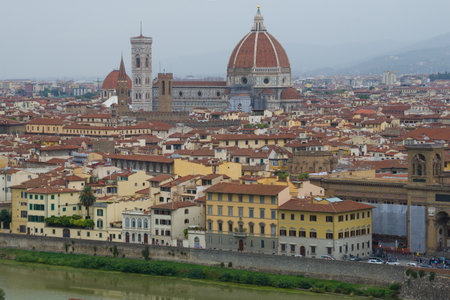 Cathedral of Santa Maria del Fiore in the cityscape on a September foggy morning. Florence, Italyのeditorial素材
