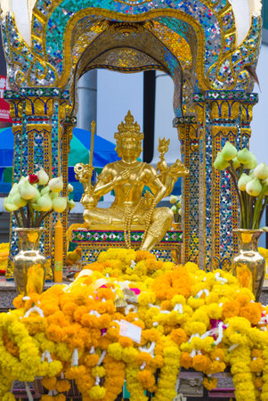 BANGKOK, THAILAND - DECEMBER 30, 2018: View of the four-faced Buddha sculpture in the Erawan Shrine sanctuaryのeditorial素材