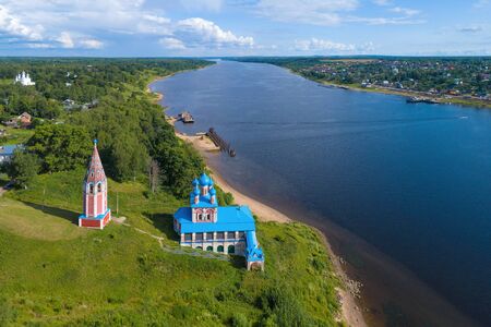 The old church of the Icon of the Mother of God of Kazan on the banks of the Volga River on a summer day (aerial photography). Tutaev, Russiaの写真素材