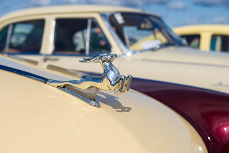Kronshtadt, RUSSIA - SEPTEMBER 14, 2019: Jumping deer - mascot on the hood of the Soviet retro car GAZ-21 "Volga". Festival of retro transport "Fortune-2019"のeditorial素材