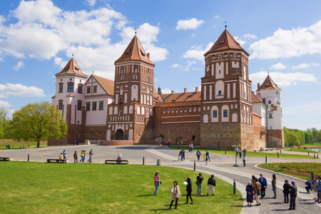MIR, BELARUS - MAY 01, 2019: Tourists at the Mir Castle on a sunny May dayのeditorial素材