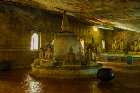 Buddhist stupa inside the ancient cave Buddhist temple Rangiri Dambulu Raja Maha Viharay (Golden Temple). Dambulla, Sri Lankaのeditorial素材