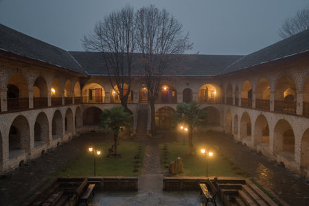 Foggy winter evening in the courtyard of the Great Caravanserai. Sheki, Azerbaijanのeditorial素材
