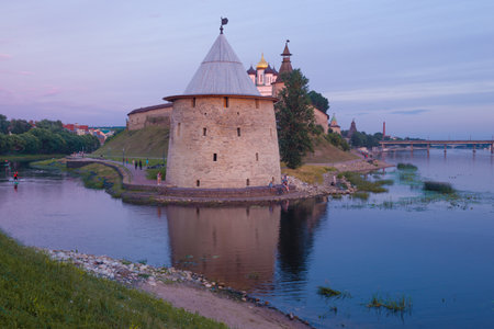 Flat tower in the Pskov Kremlin at dusk in July. Russiaのeditorial素材