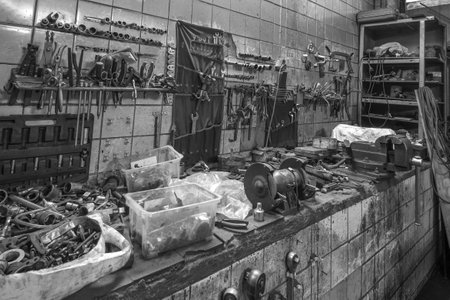 Workplace of a car mechanic in an old car service