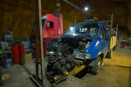 SAINT-PETERSBURG, RUSSIA - AUGUST 12, 2018: Light truck GAZ-33021 "Gazelle" with the removed engine on a cargo car serviceのeditorial素材