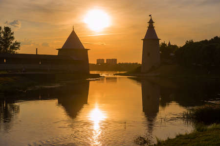 Towers of the Pskov Kremlin against the backdrop of a July sunset. Pskov, Russia