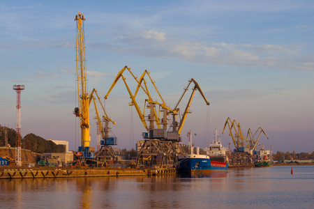 VYBORG, RUSSIA - OCTOBER 03, 2020: View of the berths of the Vyborg cargo port on a sunny October eveningのeditorial素材