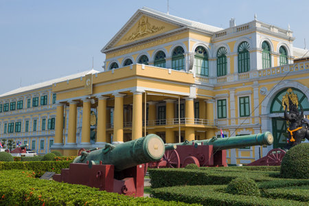 BANGKOK, THAILAND - DECEMBER 28, 2018: Antique cannons at the entrance to the main building of the Ministry of Defenseのeditorial素材