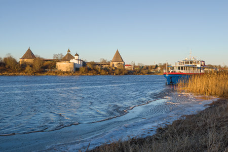 Sunny snowless morning on the Volkhov river. Staraya Ladoga, Russiaのeditorial素材