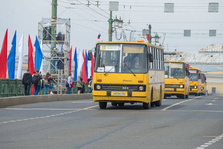 SAINT PETERSBURG, RUSSIA - MAY 25, 2019: City bus Ikarus-260.37 leads a convoy of Hungarian buses on the retro transport parade in honor of City Dayのeditorial素材