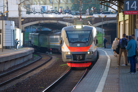 MOSCOW, RUSSIA - AUGUST 25, 2020: Electric train EP2d-0064 arrives at the platform of the Belorussky...
