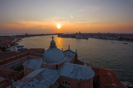 September sunset over the medieval catholic cathedral of San Giorgio Maggiore. Venice, Italyの写真素材