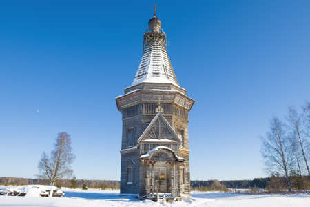 Old wooden Sreteno-Mikhailovskaya church (1655) close up on a February afternoon. Krasnaya Lyaga, Kargopol district. Arakhangelsk region, Russiaの写真素材