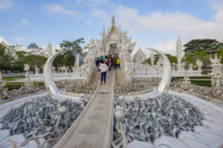 CHIANG RAY, THAILAND - DECEMBER 16, 2018: At the entrance to the Wat Rong Khun Buddhist Temple (White Temple)のeditorial素材