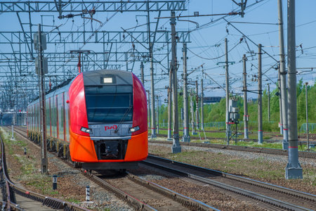 LENINGRAD REGION, RUSSIA - MAY 24, 2021: Electric train ES2GP-006 Lastochka in motion. Front view