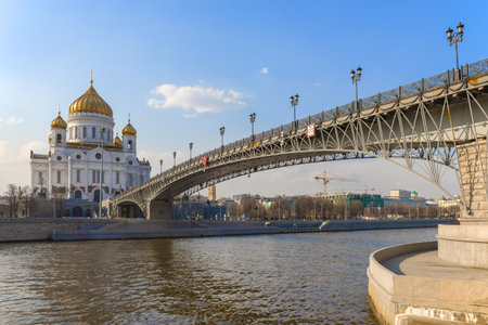 View of the Cathedral of Christ the Savior and the Patriarch Bridge on a sunny April day. Moscow, Russiaのeditorial素材