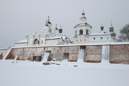 Gloomy winter day at the walls of the ancient Kirillo-Belozersky monastery. Vologda region, Russiaのeditorial素材
