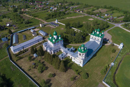 Above the temples of the Nikolo-Vyazhischsky monastery on a June day. Vyazhischi. Novgorod region,...