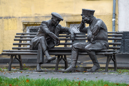 VLADIKAVKAZ, RUSSIA - OCTOBER 01, 2021: Street sculpture Backgammon Players on October afternoon