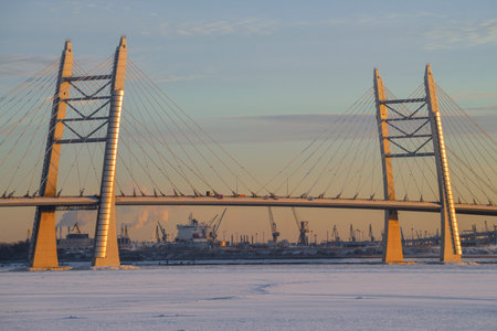 SAINT PETERSBURG, RUSSIA - DECEMBER 10, 2021: Cable-stayed bridge across the Ship Fairway on the Western High-Speed Diameter on the light of the setting sun on a December eveningのeditorial素材