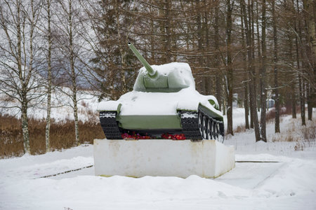 BELOZERSK, RUSSIA - DECEMBER 31, 2020: Frozen T-34 monument tank in city winter parkのeditorial素材