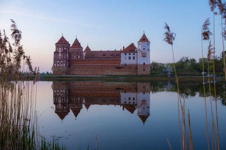 View of the ancient Mir castle in April twilight. Mir, Belarusのeditorial素材