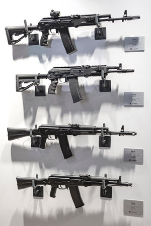 MOSCOW REGION, RUSSIA - AUGUST 25, 2020: A stand with various models of a Kalashnikov assault rifle chambered for the cartridge of NATO countries 5.56x45. Exhibit of the military-technical forum "Army-2020". Patriot Parkのeditorial素材
