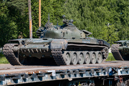 SERTOLOVO, RUSSIA - JULY 02, 2022: Tank T-72B3M on the railway platform close-up on a sunny July day