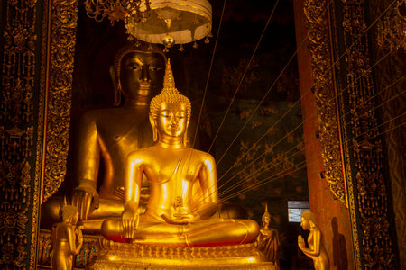 BANGKOK, THAILAND - JANUARY 03, 2019: Two Buddha sculptures on the altar of Wat Bowonniwet Buddhist templeのeditorial素材