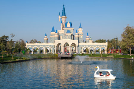 TASHKENT, UZBEKISTAN - SEPTEMBER 03, 2022: Lake and fairytale castle in Magic City entertainment townのeditorial素材