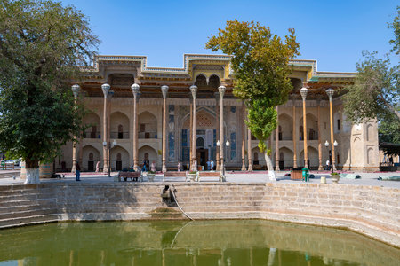 BUKHARA, UZBEKISTAN - SEPTEMBER 09, 2022: View of the ancient Bolo-Hauz mosque on a sunny dayのeditorial素材