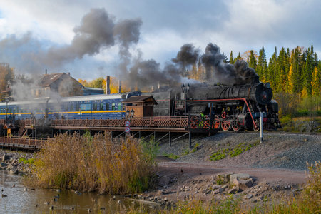 SORTAVALA, RUSSIA - OCTOBER 09, 2022: Tourist retro train Ruskeala Express arrived at the station...
